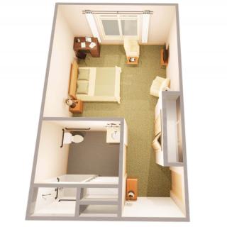 A 3D floor plan of a small apartment featuring a bedroom, bathroom, and living area.