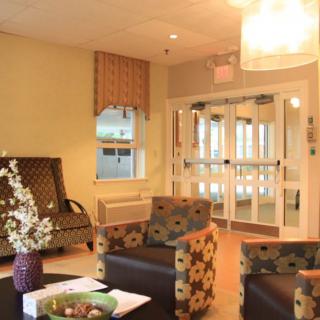 A cozy and well-decorated lobby area with comfortable seating and ambient lighting.