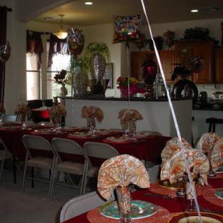 A beautifully decorated dining area set for a festive occasion.
