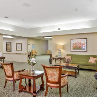 A cozy lounge area with comfortable seating and tasteful decor.