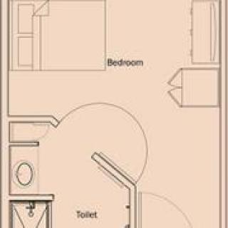 A simple floor plan featuring a bedroom and a toilet.