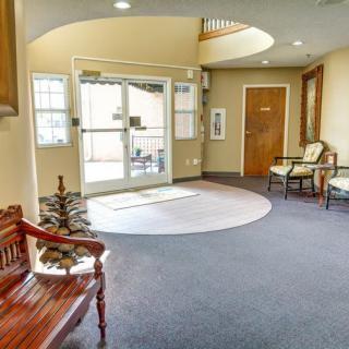 A cozy waiting area with seating and natural light.