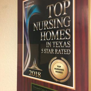 Plaque recognizing top nursing homes in Texas with a 4-star rating for the year 2018.