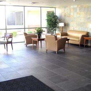 A modern lobby with comfortable seating and natural light.