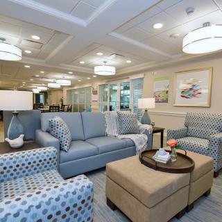 A modern living room with comfortable seating and stylish decor.