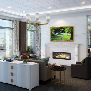 A modern living room featuring a cozy fireplace, comfortable seating, and stylish decor.