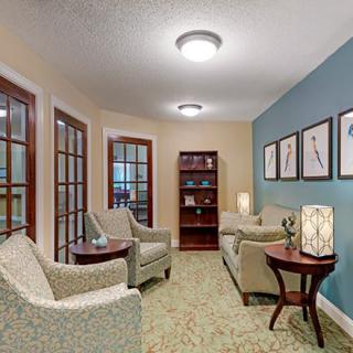 A cozy living room with comfortable seating and tasteful decor.