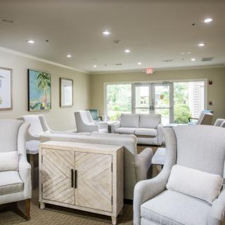 A modern living room with comfortable seating and natural light.