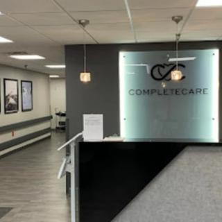A modern reception area in a clinic with stylish decor.