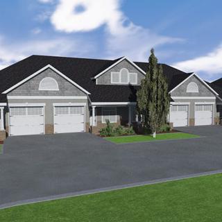 A suburban duplex with two garages and a driveway.