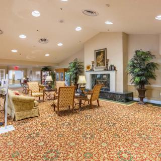 A cozy lobby with comfortable seating and elegant decor.