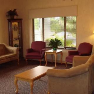 A cozy living room with comfortable seating and a coffee table.