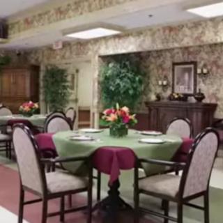 A well-decorated dining area with tables set for a meal.