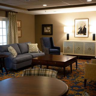 A cozy living room with comfortable seating and tasteful decor.