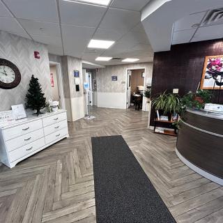A well-designed office reception area featuring modern decor and holiday spirit.