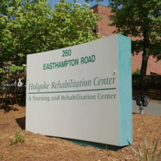 A sign for the nursing and rehabilitation center located on Easthampton Road.