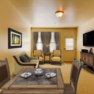 A cozy living room with modern furniture and warm lighting.
