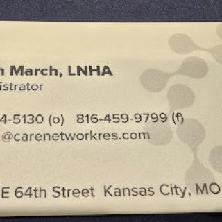 Business card of an administrator in the healthcare sector, featuring contact details and location.