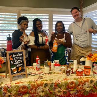 A cheerful gathering featuring a delightful spread of autumn-inspired drinks and treats.