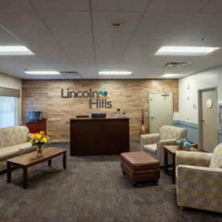 A well-lit reception area with comfortable seating and a welcoming atmosphere.