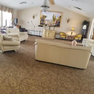 A spacious living room with comfortable sofas and elegant decor.