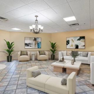 A spacious and modern lobby with comfortable seating and elegant decor.