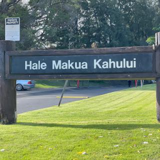 Sign for Hale Makua Kahului, indicating a facility located in a green area.