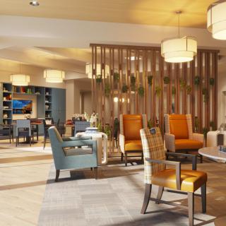 A modern hotel lobby with comfortable seating and stylish decor.