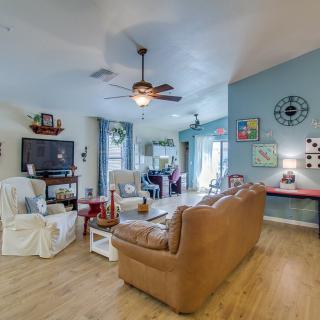 A cozy living room with comfortable seating and stylish decor.