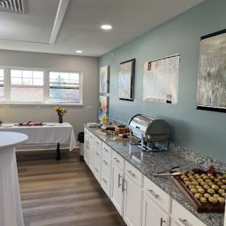 A beautifully arranged buffet setup in a modern interior, perfect for gatherings and events.