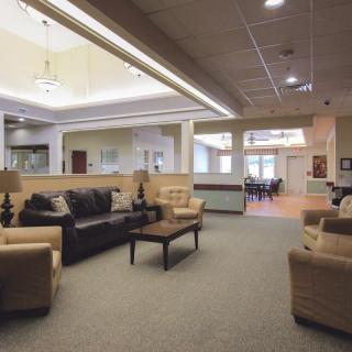 A modern living room with comfortable seating and elegant decor.