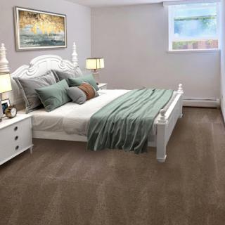 A serene and modern bedroom featuring a comfortable bed with soft bedding, stylish lamps, and natural light from the window.