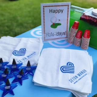 A festive setup for a birthday celebration featuring themed napkins and decorations.