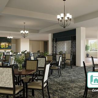 Elegant dining area with neatly arranged tables and chairs, illuminated by stylish chandeliers.