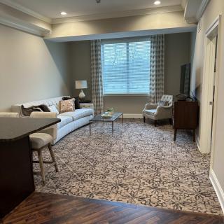 A cozy living room with modern furnishings and elegant decor.