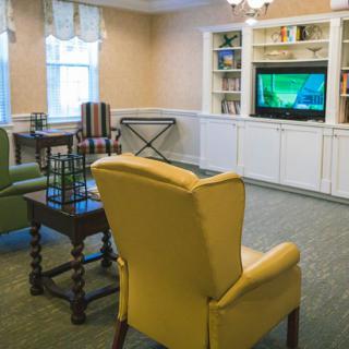 A cozy living room with comfortable seating and a television.