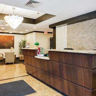 A welcoming reception area with modern decor and comfortable seating.