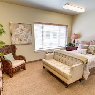 Cozy and inviting bedroom with a blend of comfort and style.