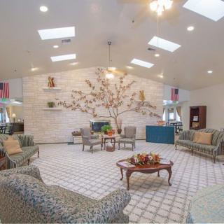 A spacious and well-decorated lobby with comfortable seating and modern decor.