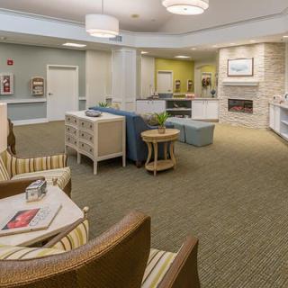 A spacious and well-decorated lobby with comfortable seating and ambient lighting.