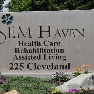 Sign for a health care and assisted living facility at 225 Cleveland.