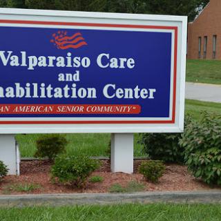 Sign for Valparaiso Care and Rehabilitation Center, serving senior communities.