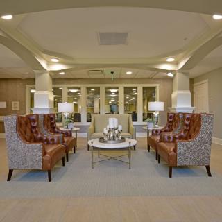 A modern hotel lobby with comfortable seating and stylish decor.