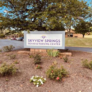 Welcome to Skyview Springs Assisted Living Center, surrounded by well-maintained landscaping.