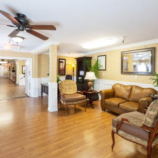 A cozy living room with comfortable seating and elegant decor.