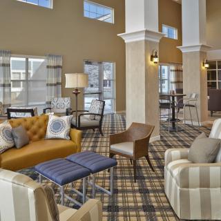 A modern and cozy lobby with comfortable seating arrangements.