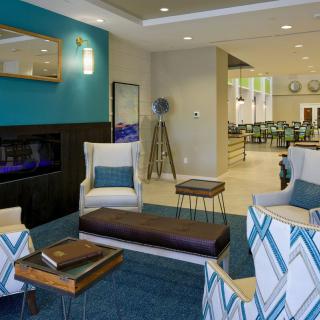 A modern living room with stylish furniture and a cozy atmosphere.
