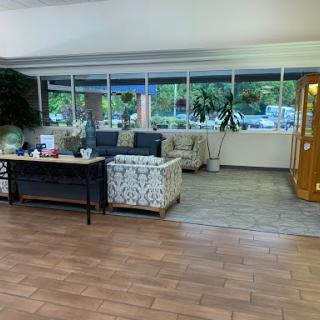 A cozy lobby area with comfortable seating and plenty of natural light.