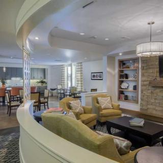 A modern living room with comfortable seating and stylish decor.