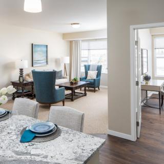 A modern open-plan living and dining area with stylish decor.